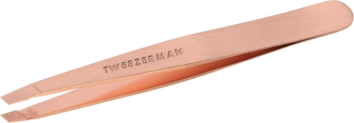 Tweezerman rose gold slant tweezer close-up of precise tips for brow shaping