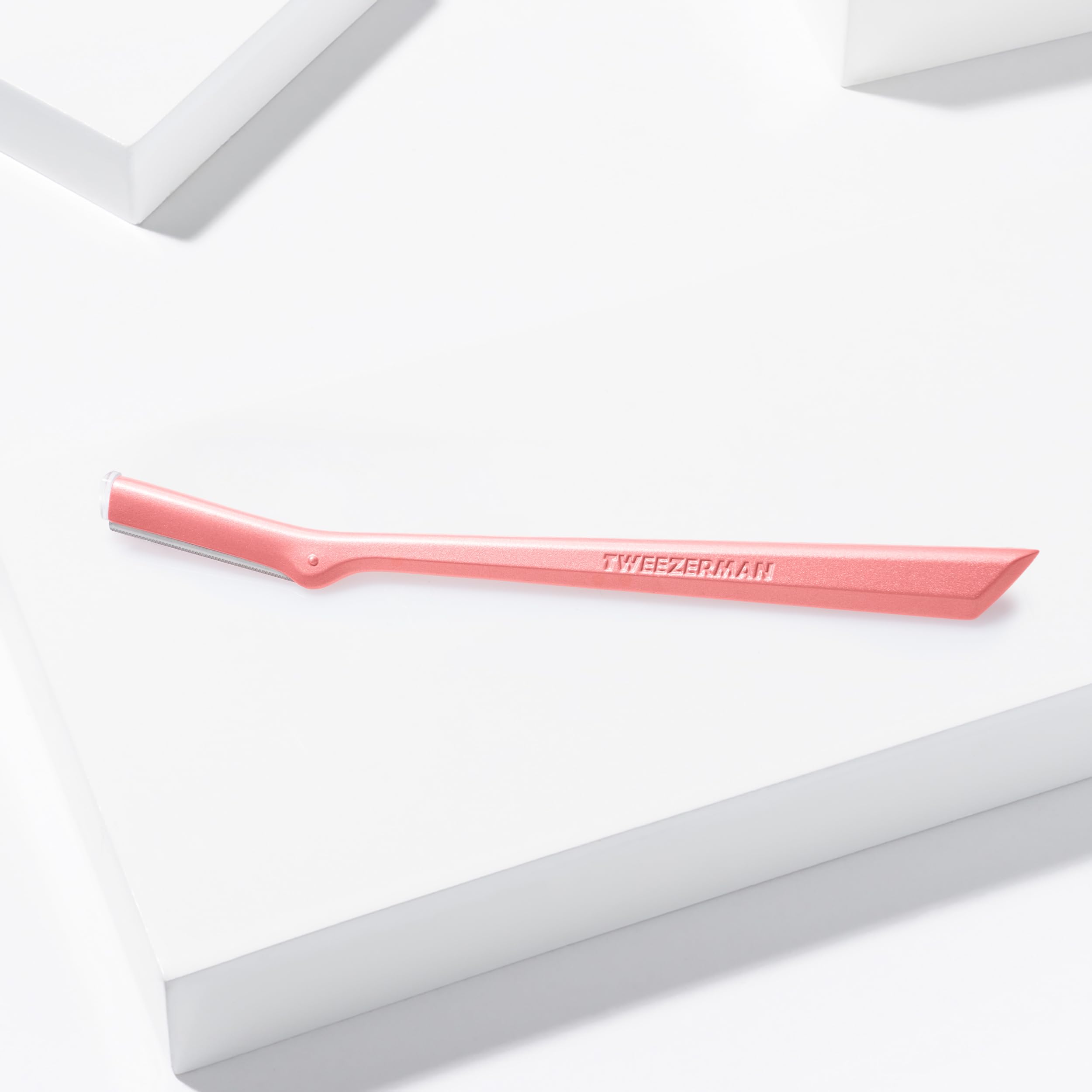 Tweezerman Tea Rose Razor strokes follow hair growth for comfort.