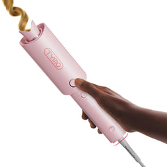 TYMO CurlPRO auto-rotating iron creates quick, beachy waves.