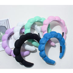 TYSSELY spa headband suitable for skincare, makeup, shower, and yoga sessions.