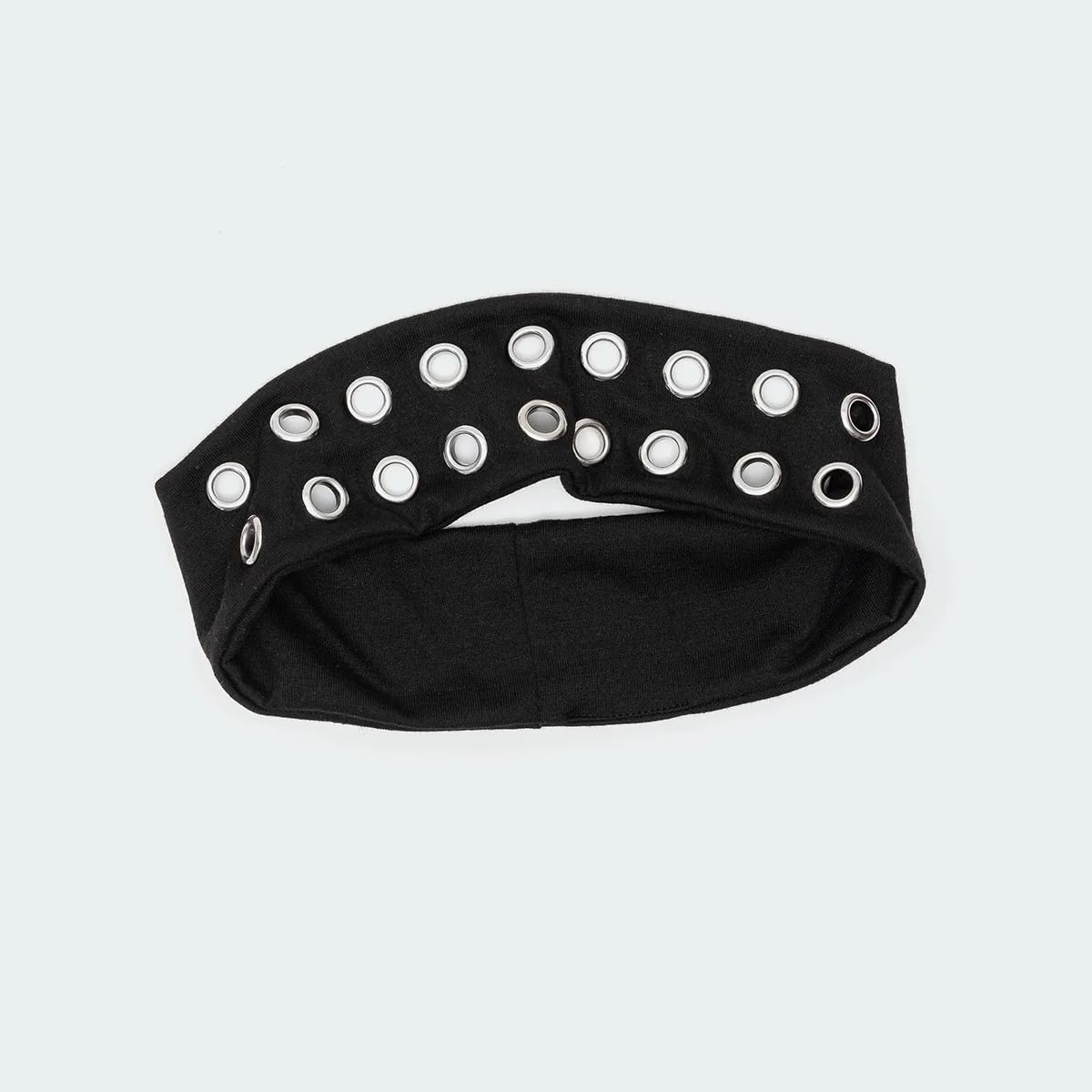 Closeup of metal eyelets on Uchyius grommet headband highlighting durable industrial details