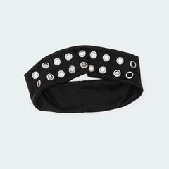 Closeup of metal eyelets on Uchyius grommet headband highlighting durable industrial details