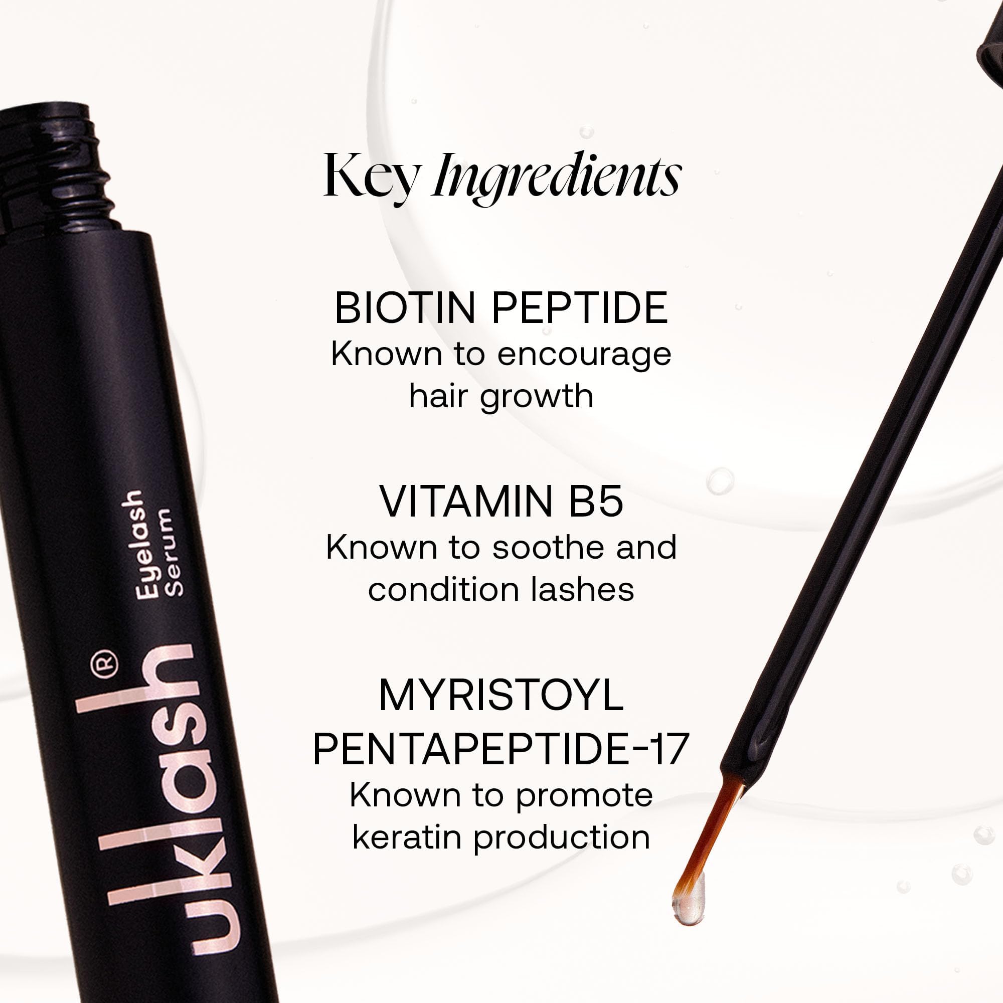 UKLASH Eyelash Growth Serum close-up brush applying along lash line for targeted growth.