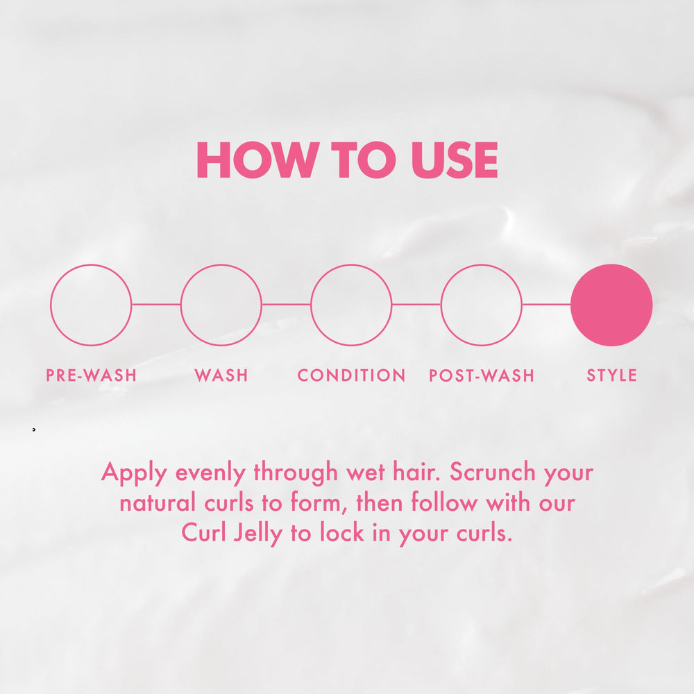 Umberto Giannini Curl Definition close-up highlights defined natural curl shape.