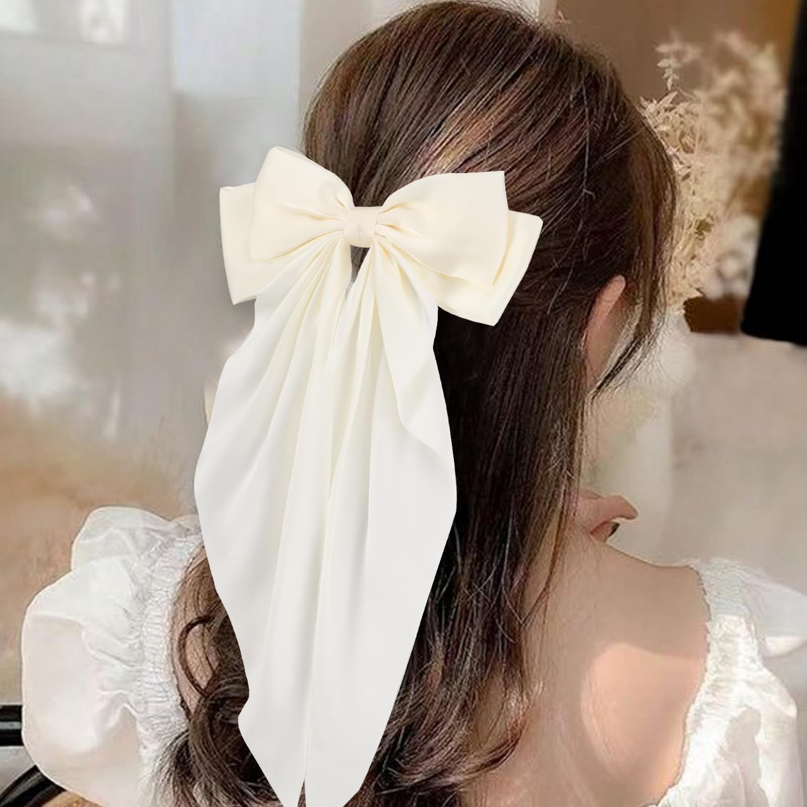 Unbednigt detalle satinado de lazo: toque suave y lujo discreto.