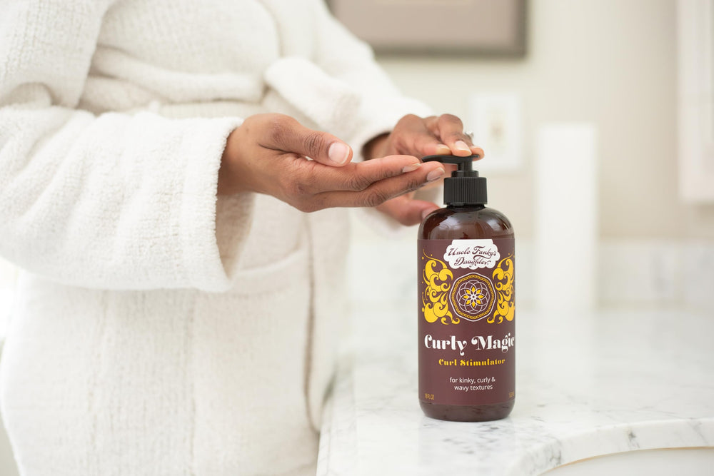 Uncle Funky's Daughter Curly Magic 32 oz bottle pump top for easy application.