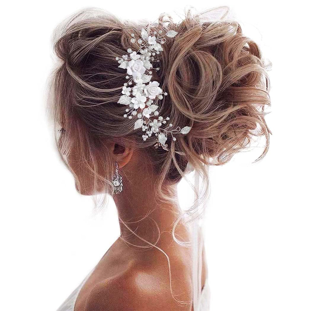 Diadema floral de Unicra con perlas y cristales, ideal para novias.