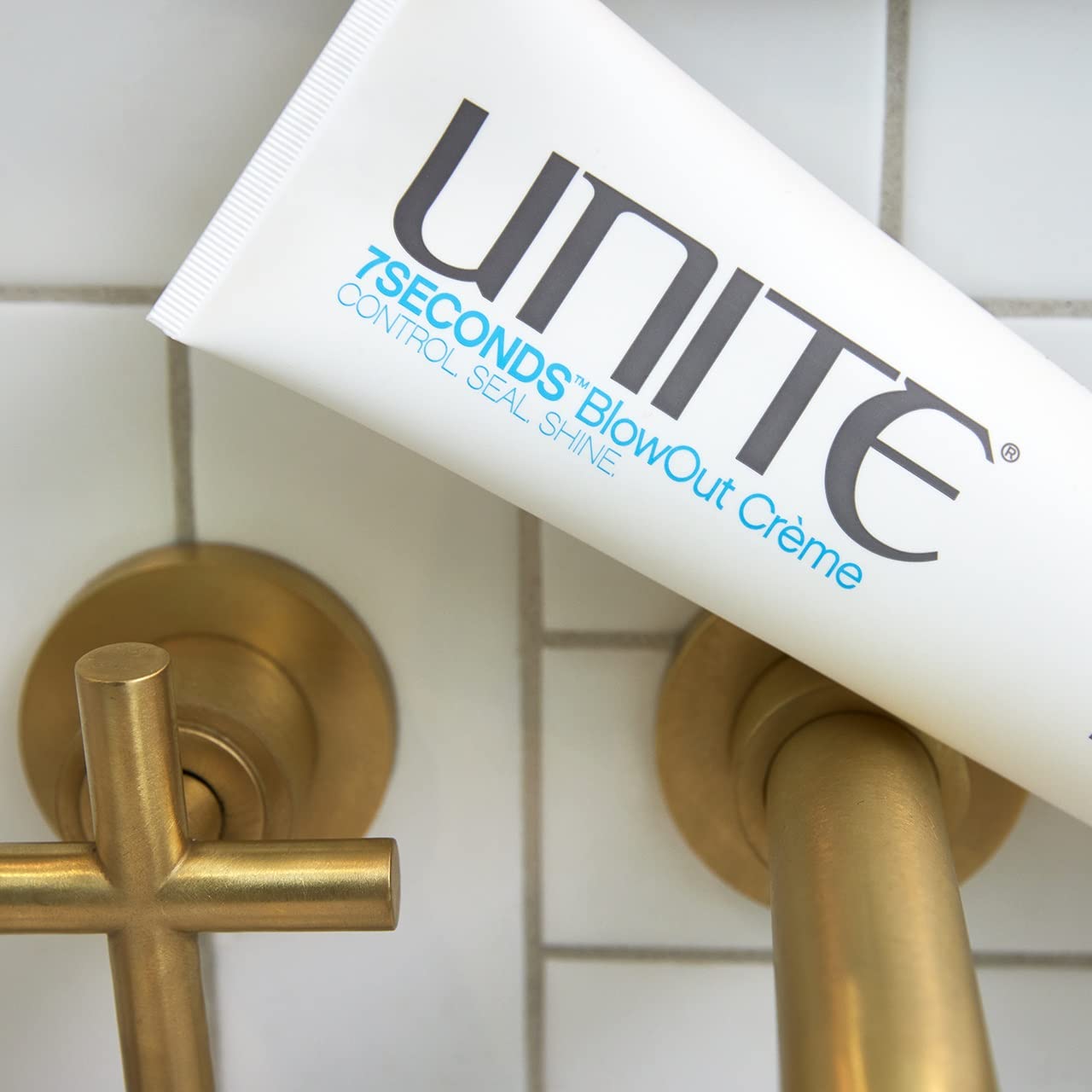 UNITE 7SECONDS BlowOut Creme offers frizz control and humidity protection during styling.
