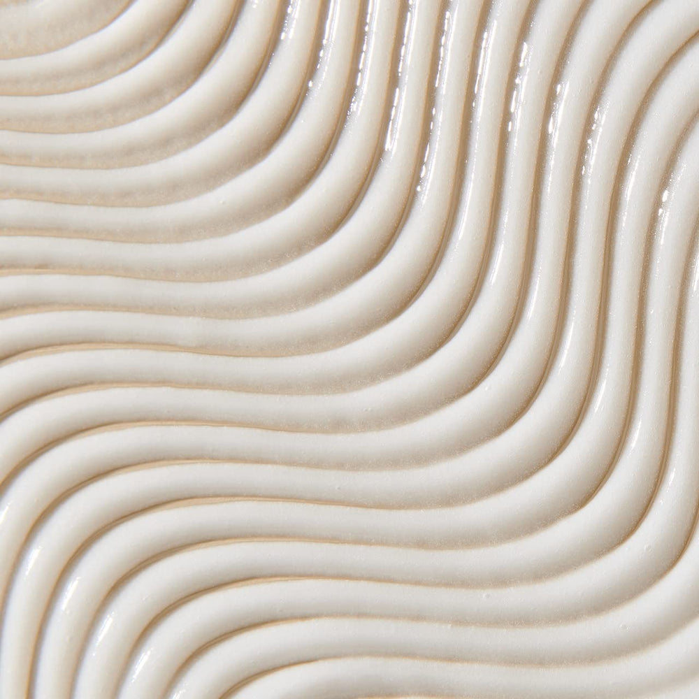 UNITE 7SECONDS BlowOut Creme provides UV and thermal protection for daily styling.
