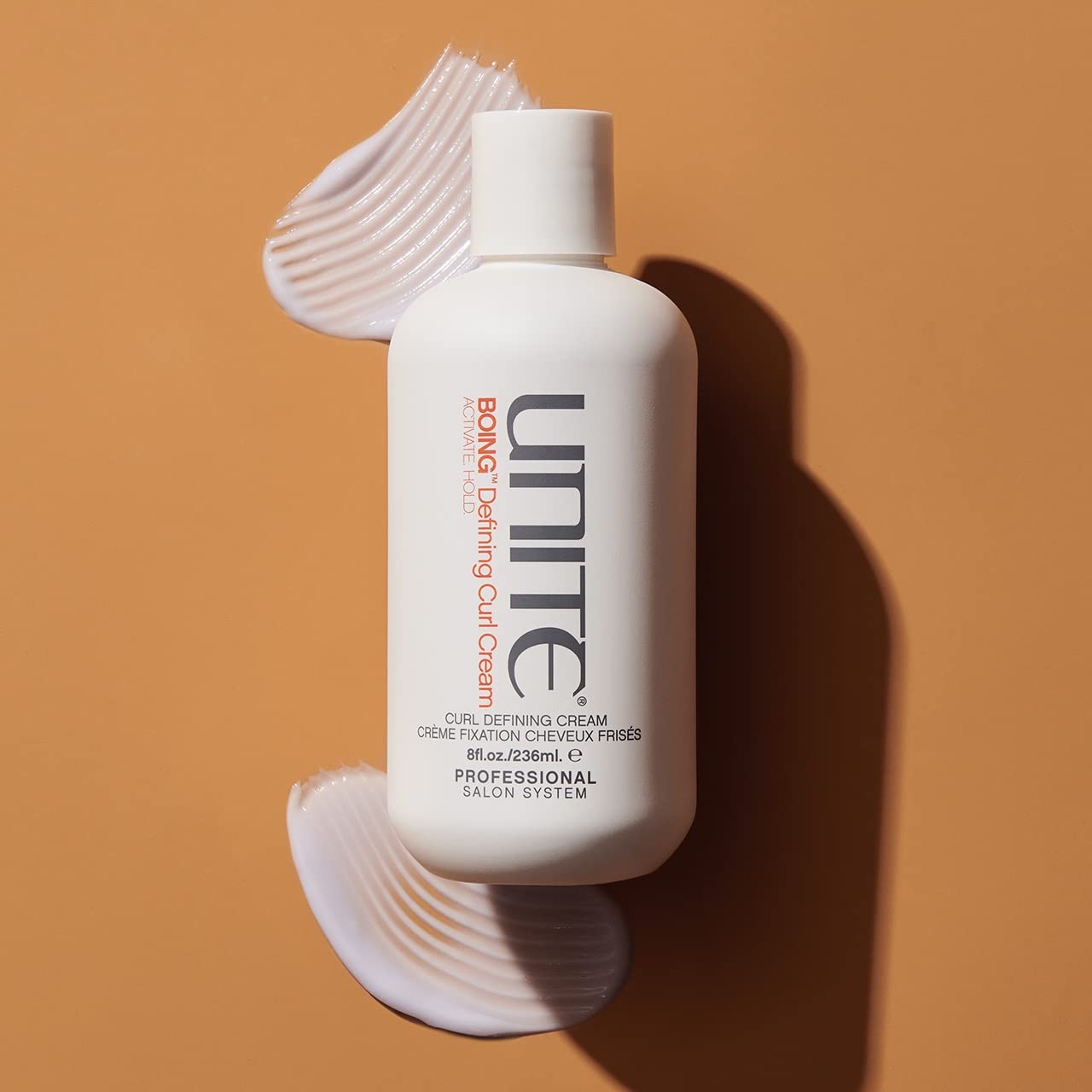 UNITE BOING Defining Curl Cream pump highlighting easy application for smooth, lasting hold
