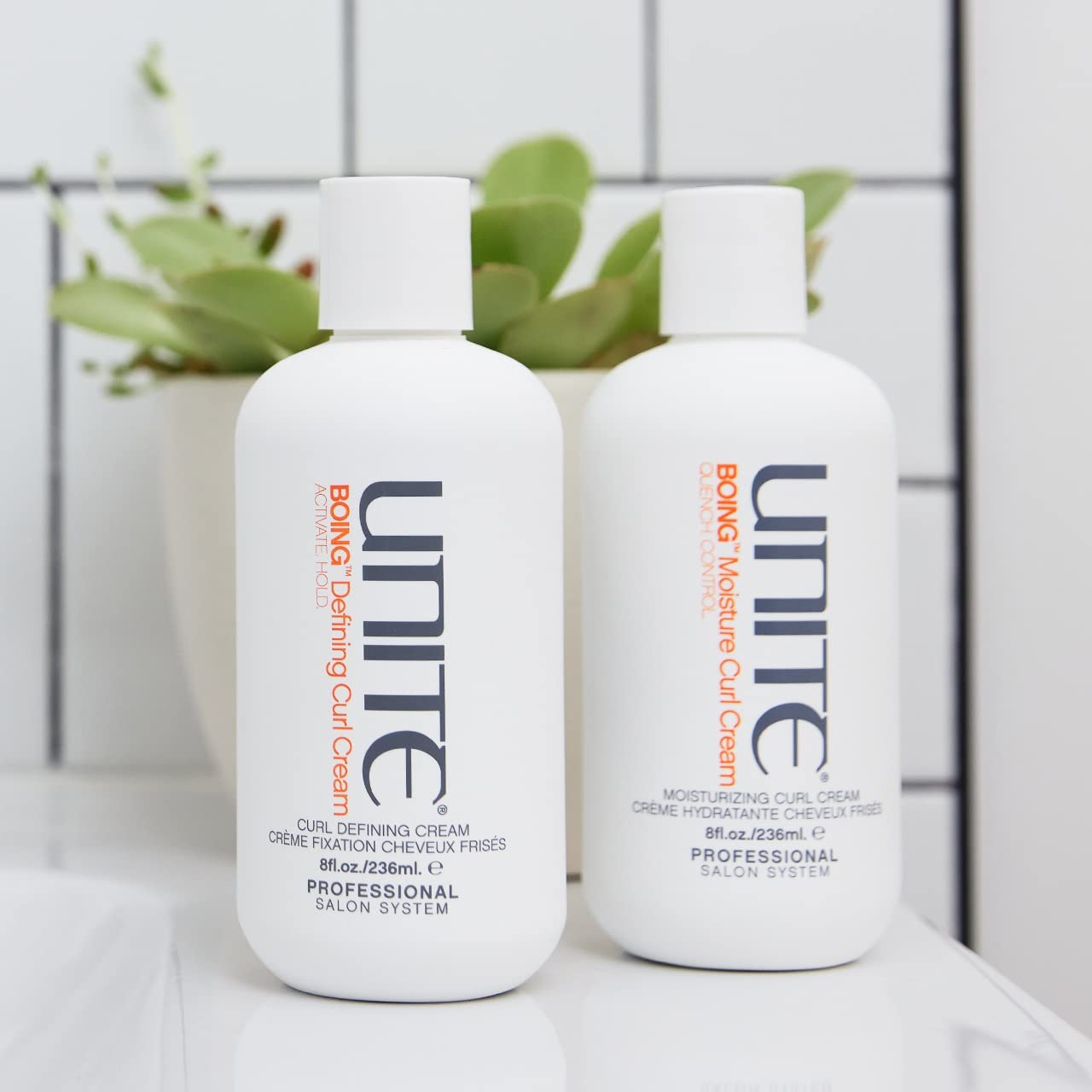UNITE BOING Defining Curl Cream closeup on textured curls emphasizes shine and frizz control