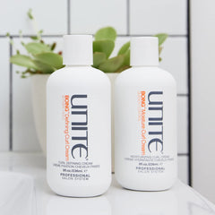 UNITE BOING Defining Curl Cream closeup on textured curls emphasizes shine and frizz control