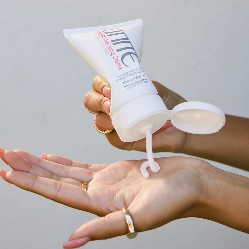 UNITE BOOSTA product highlighting UV and heat protection during styling.