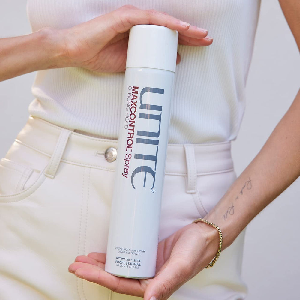 UNITE MAXCONTROL hairspray spray nozzle delivering even, flake-free mist for flexible hold.