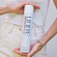 UNITE MAXCONTROL hairspray spray nozzle delivering even, flake-free mist for flexible hold.