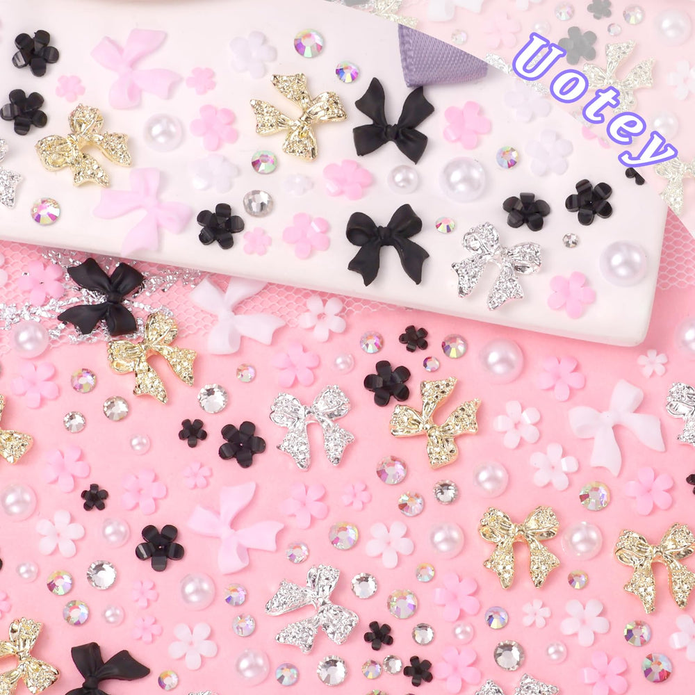 Uotey 3D bow nail charms in black elevate edgy nail art.