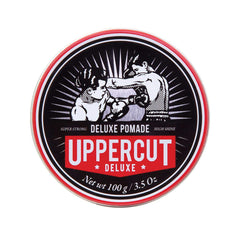 Pomada Uppercut Deluxe en envase de 100 g con fijación duradera.