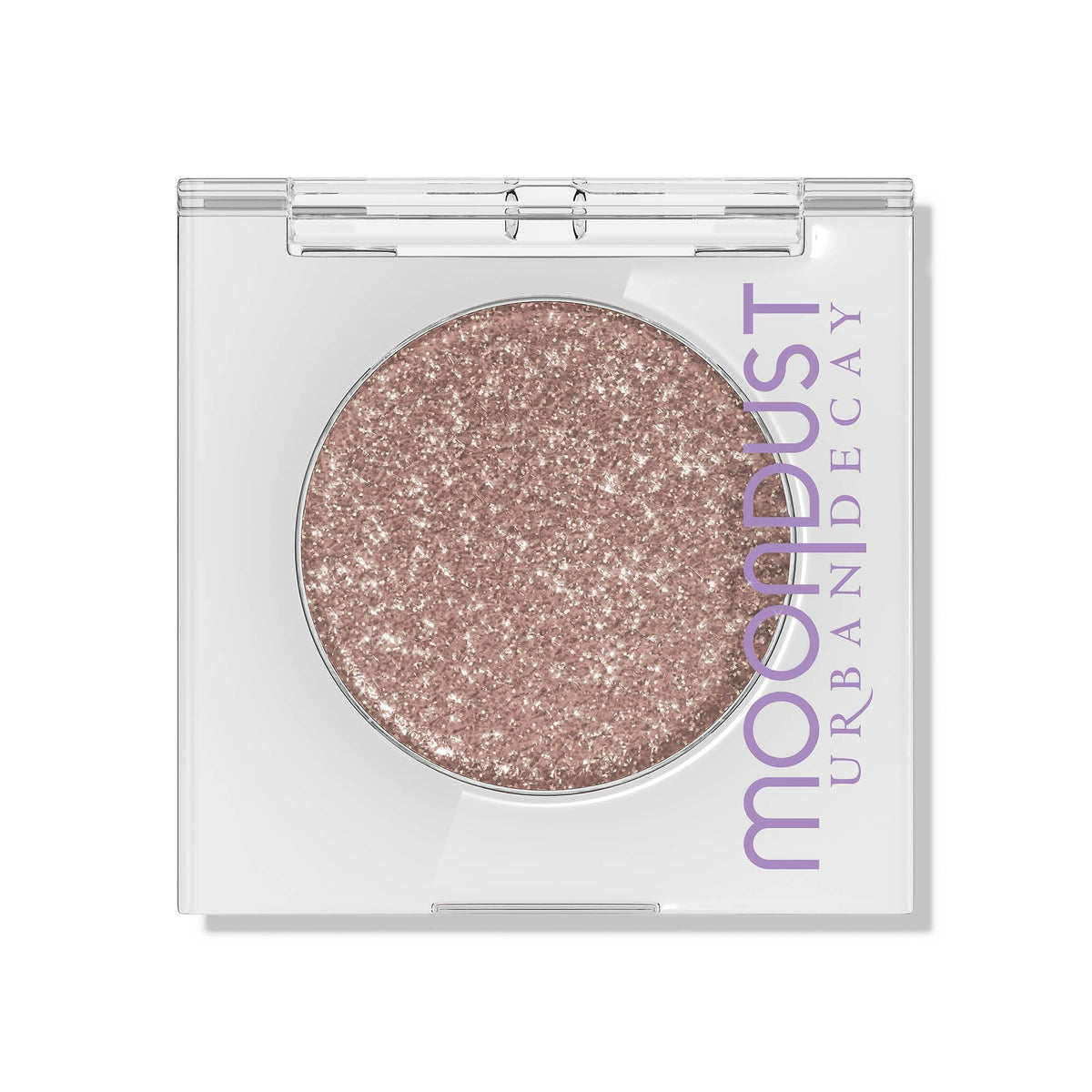 Urban Decay Moondust Space Cowboy swatch shows champagne gold sparkle on the eyelid.