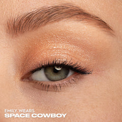 Urban Decay Moondust wet-look finish enhances depth with a glossy sheen.