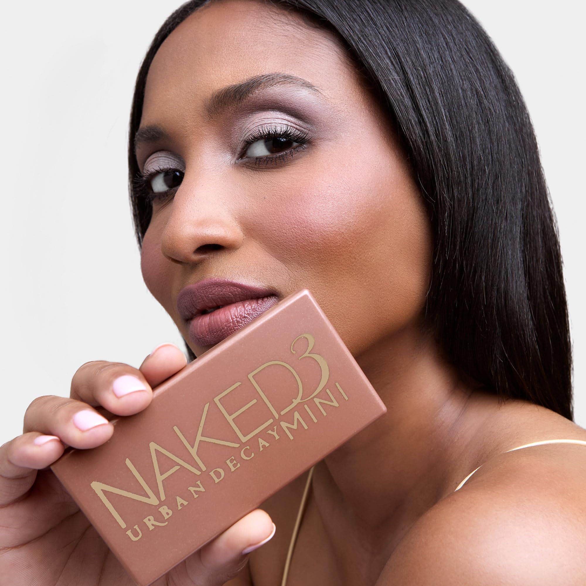 Urban Decay Naked3 Mini portable palette perfect for on-the-go makeup.