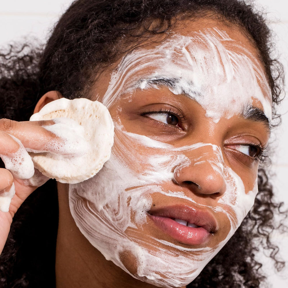 Clarifying mask application with Urban Skin Rx clarifying bar for refined pores.