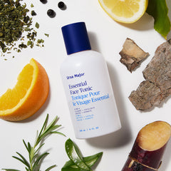 Ursa Major Essential Face Tonic splash on skin for refreshing hydration.