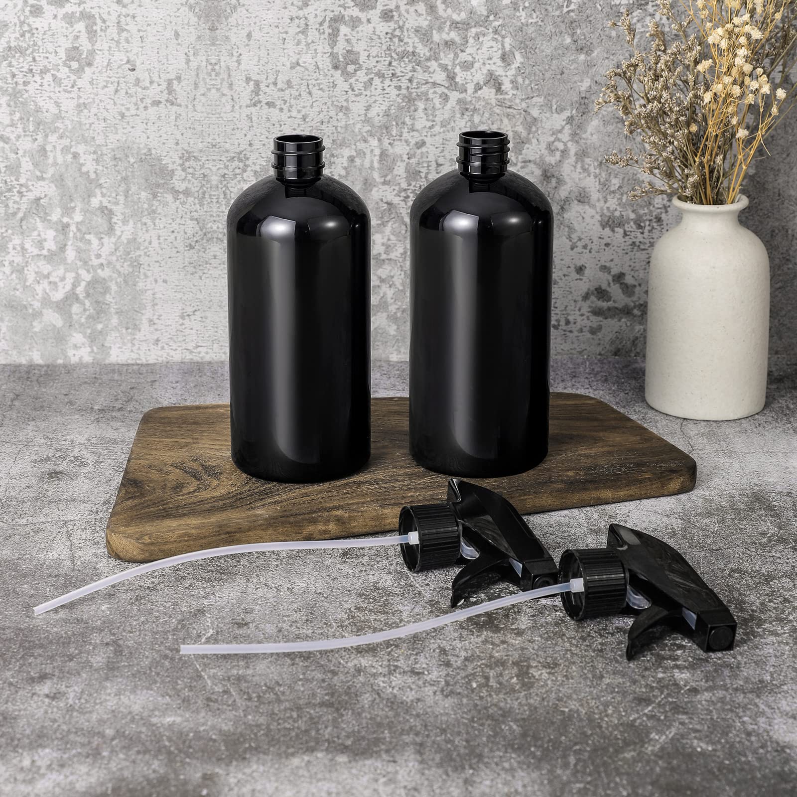 UUJOLY 17oz spray bottle side view shows ergonomic grip for easy use.
