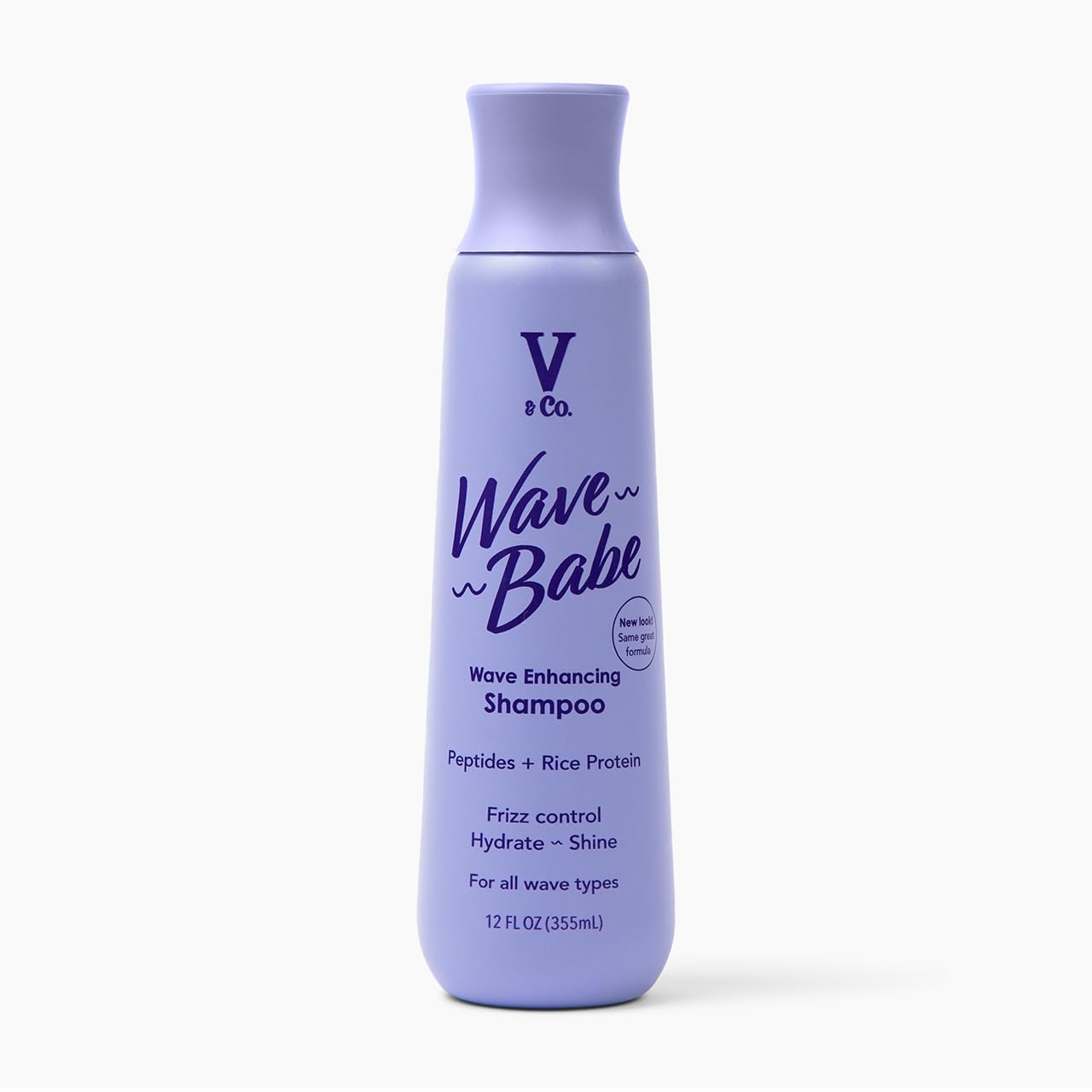 V&Co Wave Babe shampoo bottle on shelf showing frizz-control promise