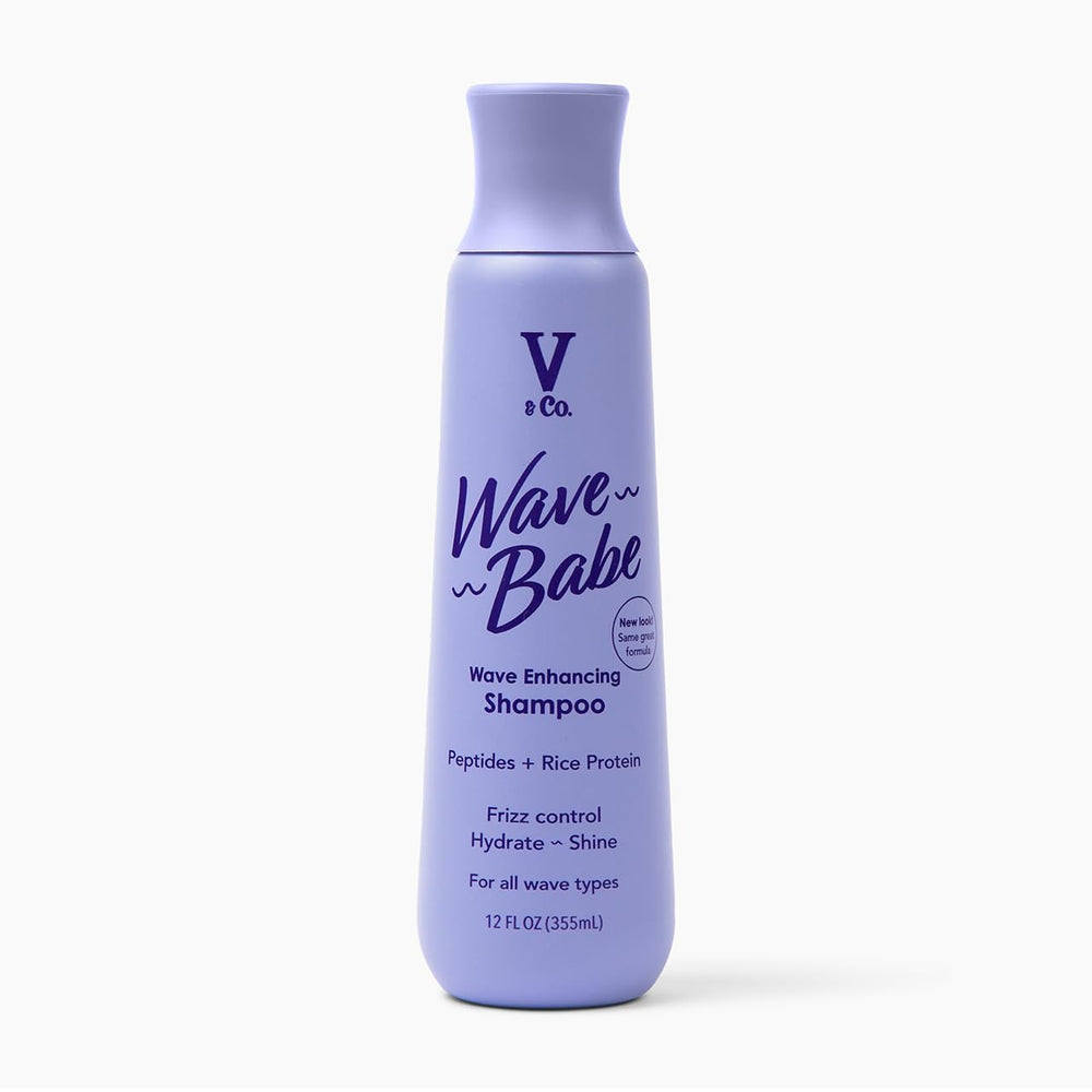 V&Co Wave Babe shampoo bottle on shelf showing frizz-control promise