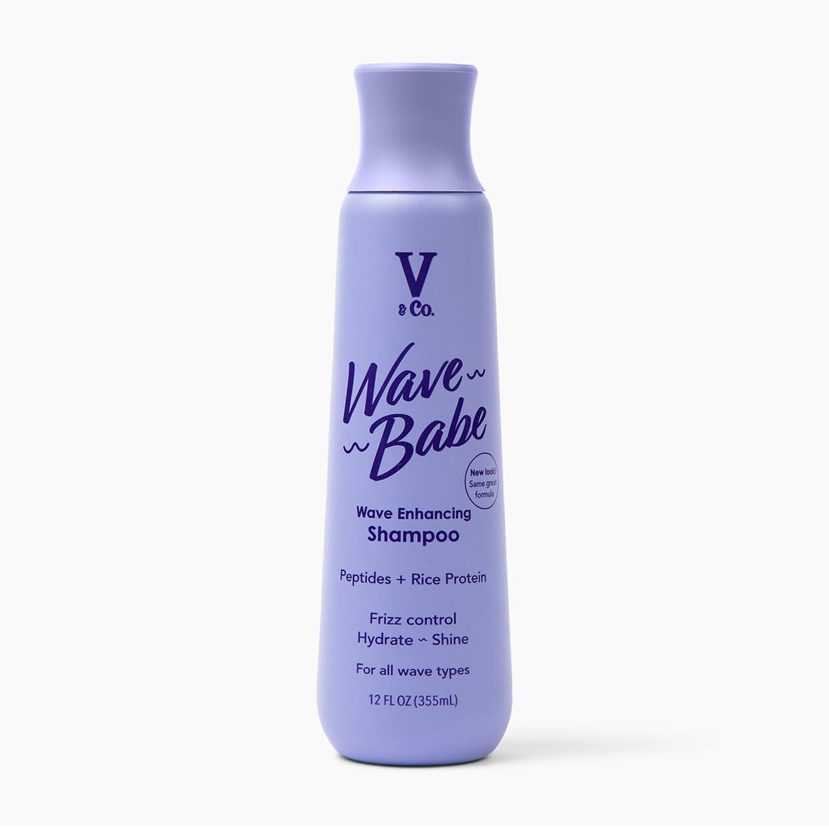 V&Co Wave Babe shampoo bottle on shelf showing frizz-control promise