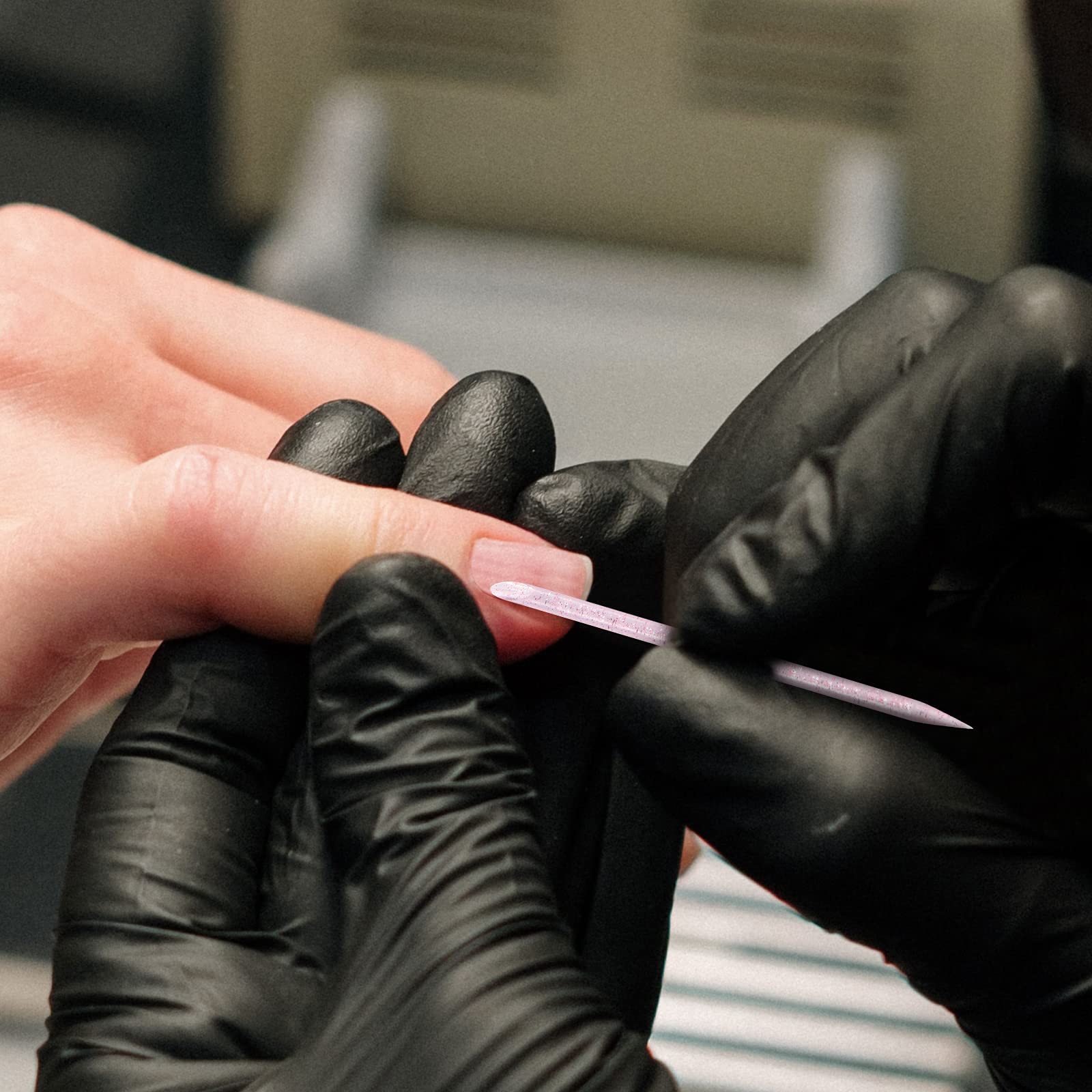 Vaincre cuticle pusher beveled end gently reshapes cuticles.