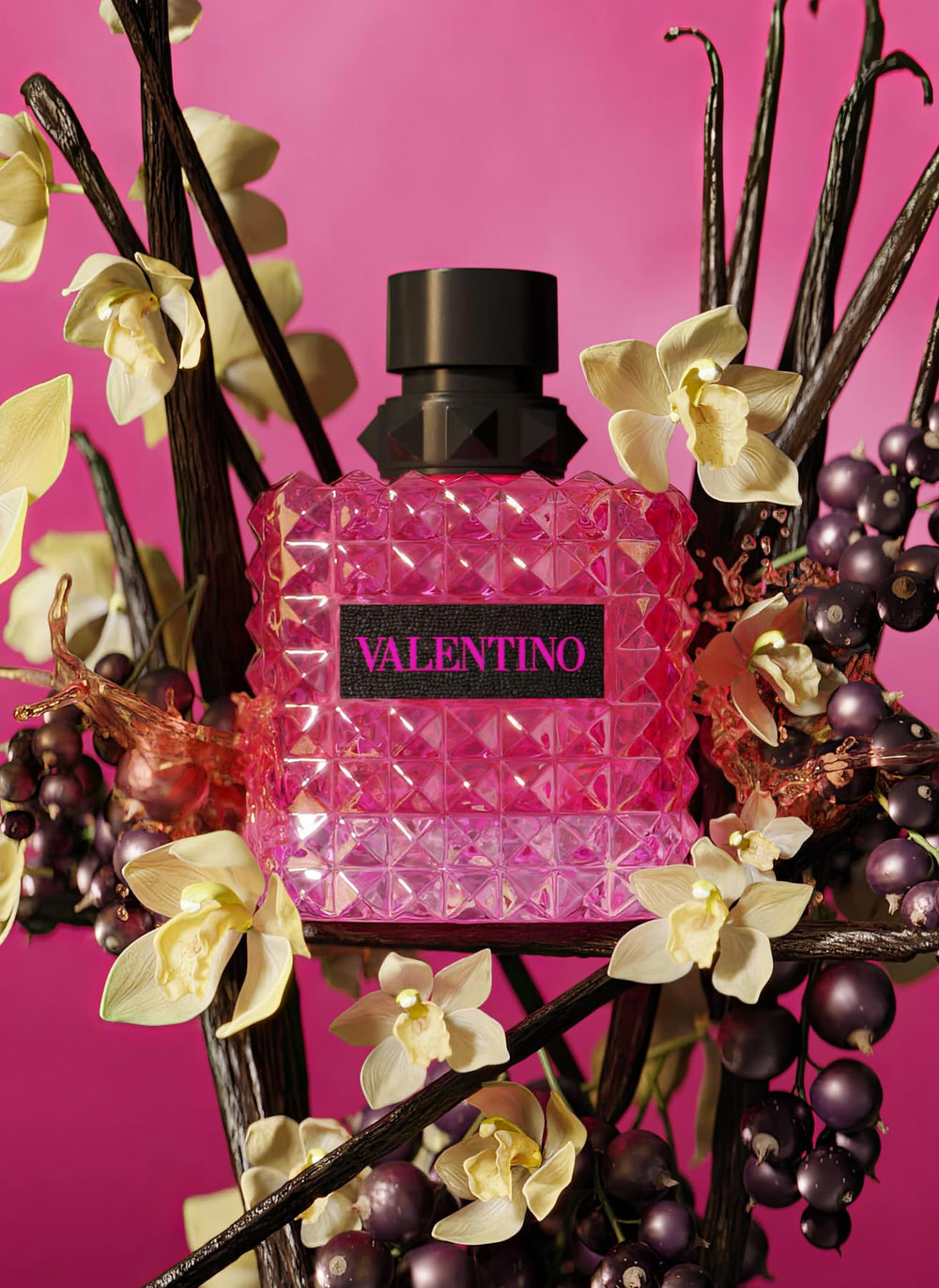 Valentino Born in Roma Extradose pink cap detail on elegant bottle.