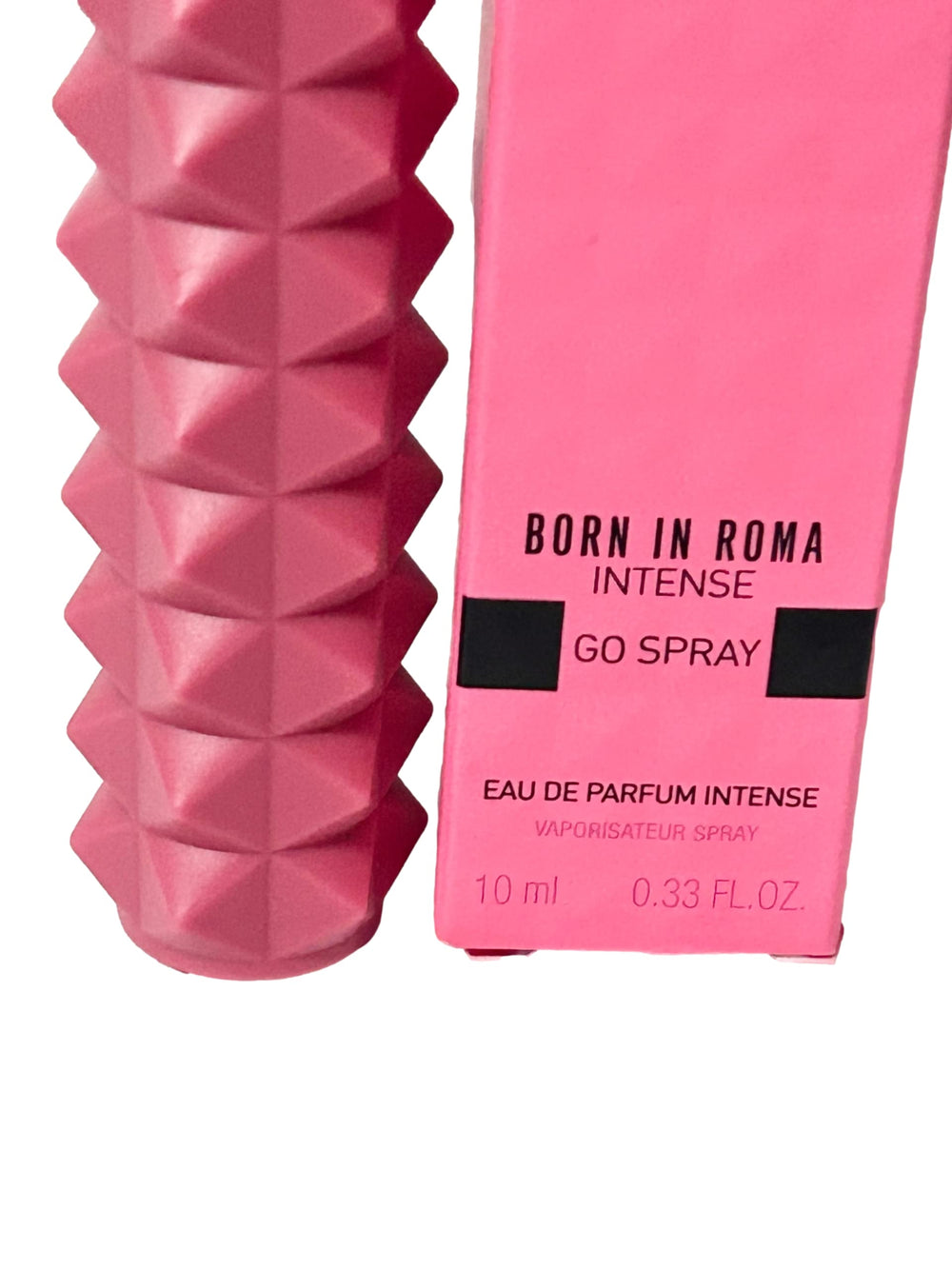 Valentino Donna Born in Roma Intense travel spray bottle side view showing compact design.