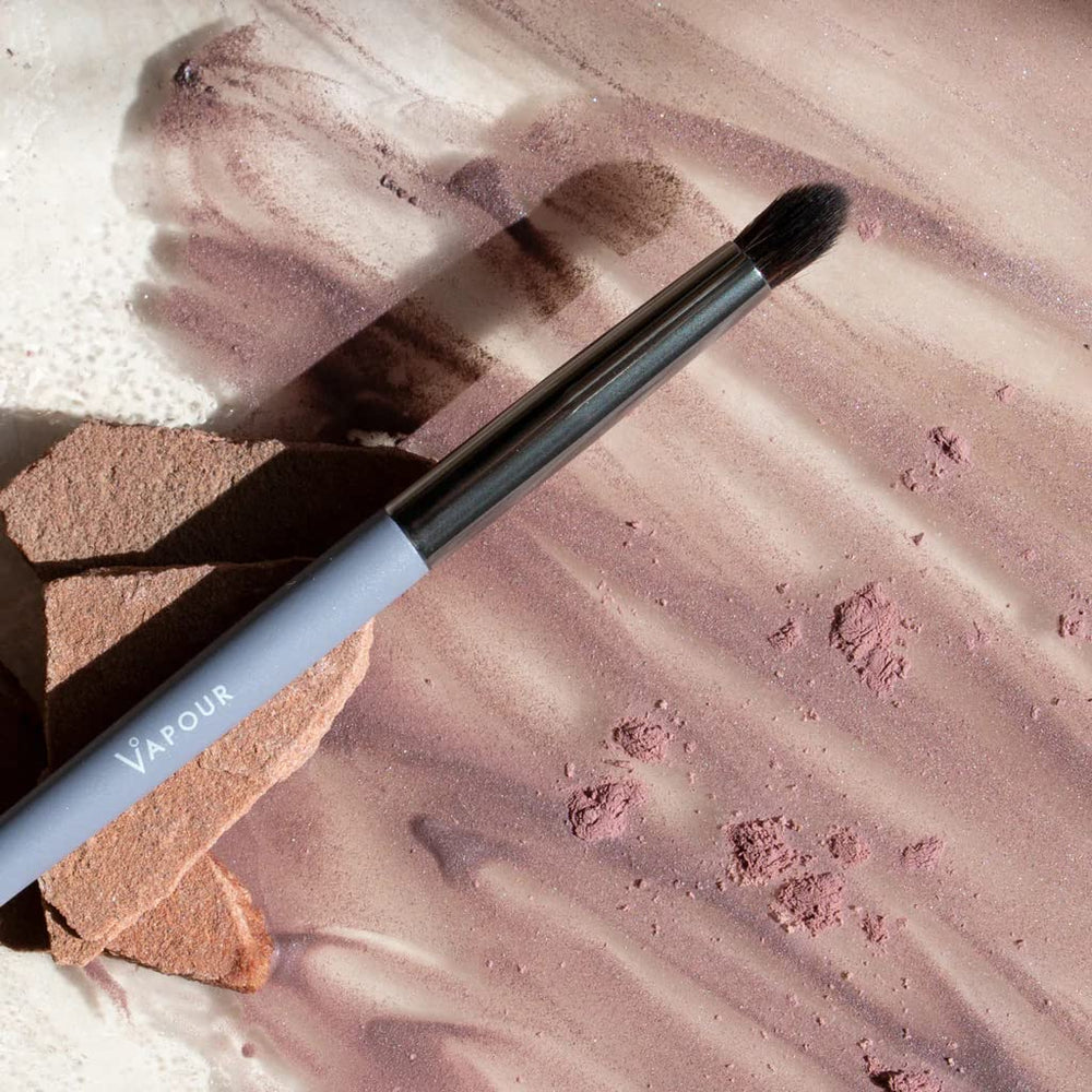 Vapour Beauty detail brush reaches creases for precise blending and depth.
