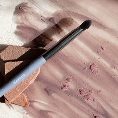 Vapour Beauty detail brush reaches creases for precise blending and depth.