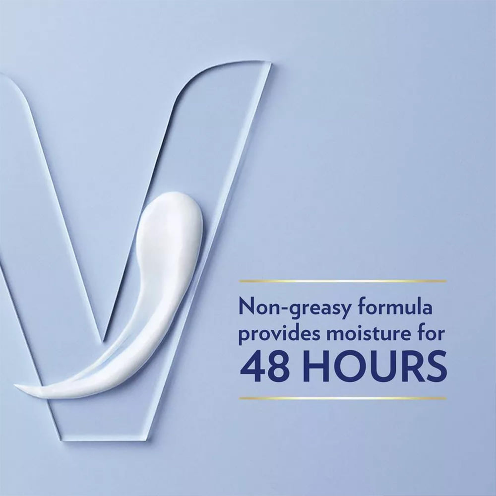 Hands applying Vaseline Nourishing Moisture Lotion from the 2-pack for quick absorption.