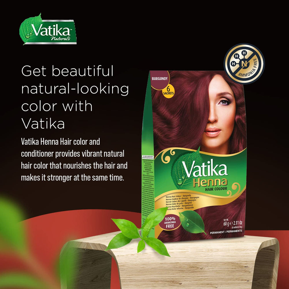 Vatika Naturals Burgundy dye being applied for even color coverage.