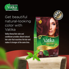 Vatika Naturals Burgundy dye being applied for even color coverage.