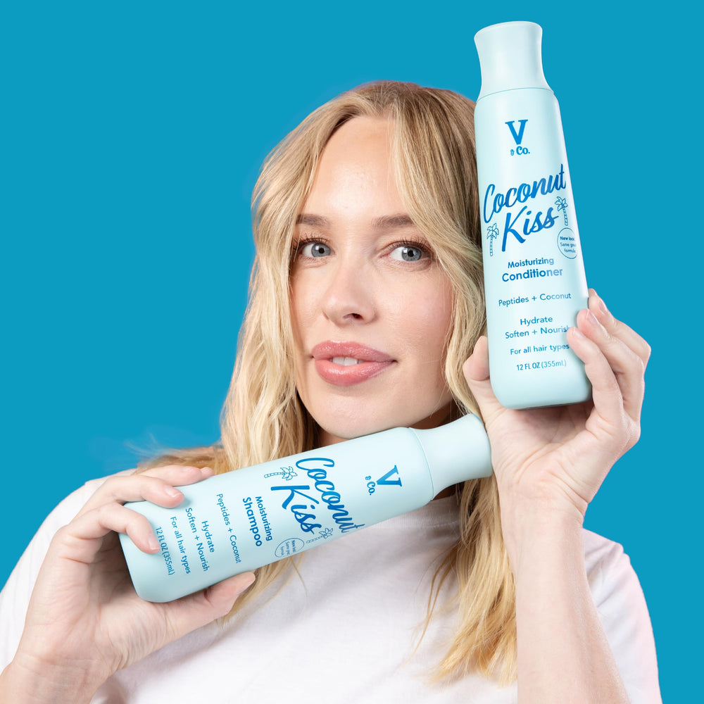Bottle of V&Co Moisturizing Conditioner on shelf ready for routine