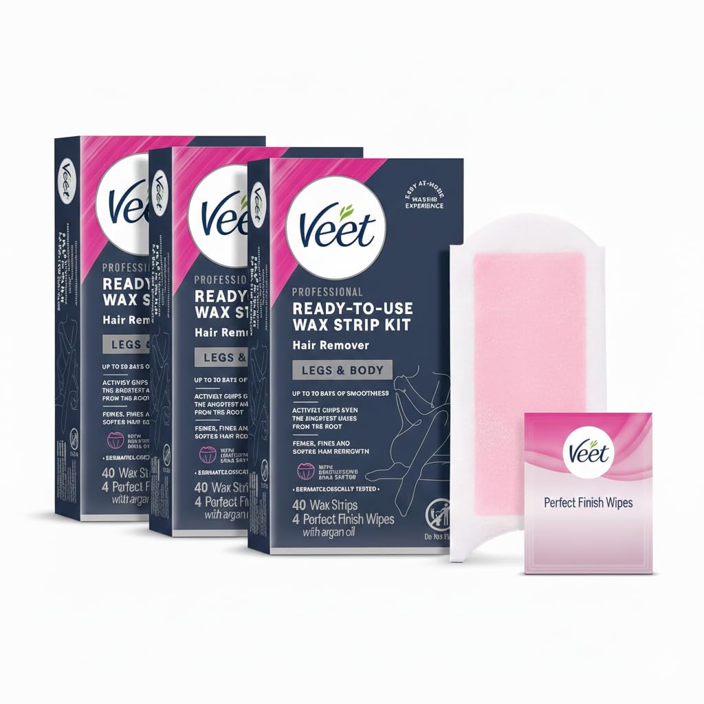 Veet sugar wax strips on leg for long-lasting smooth skin at home.