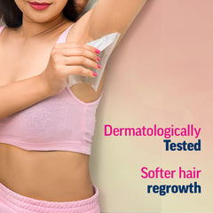 Veet waxing strip removal action on leg