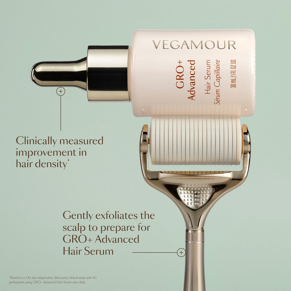 VEGAMOUR GRO+ dermaroller in vertical rolling motion on scalp