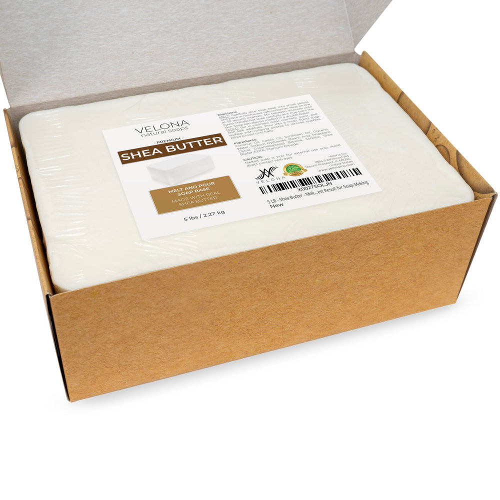 Velona handmade gift soaps displayed in elegant packaging.