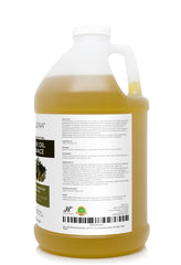 Pouring Velona Olive Pomace Oil shows smooth texture ideal for DIY blends