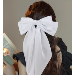 VELSCRUN pink satin hair bow with a big clip adds playful style