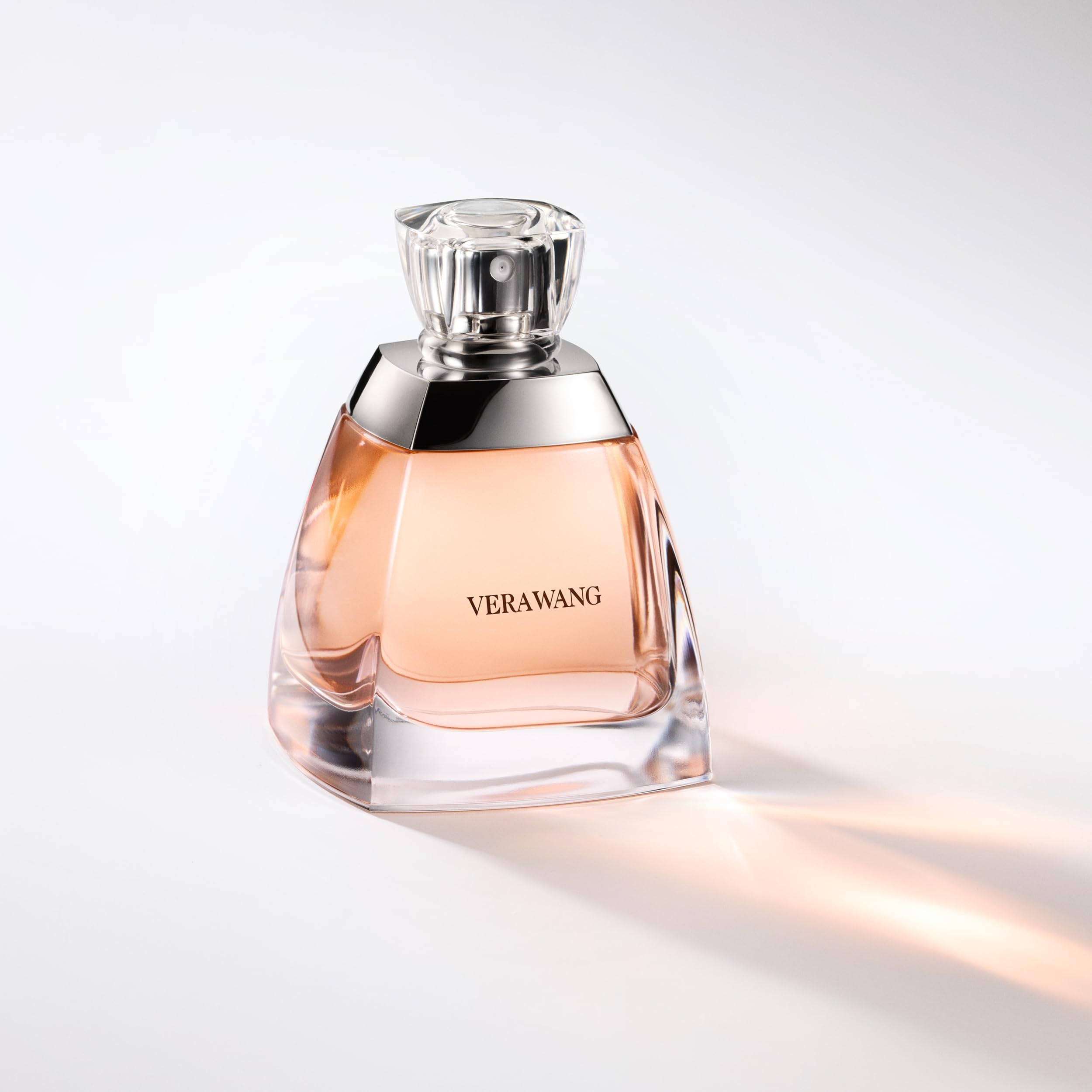 Vera Wang EDP sandalwood tones, adds depth for cooler seasons.