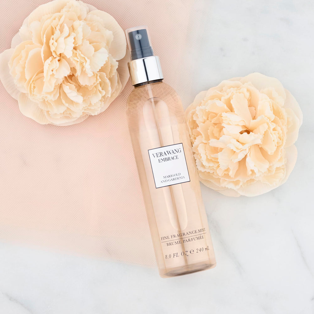 Close-up of the Vera Wang Embrace Merigold & Gardenia label highlighting notes.