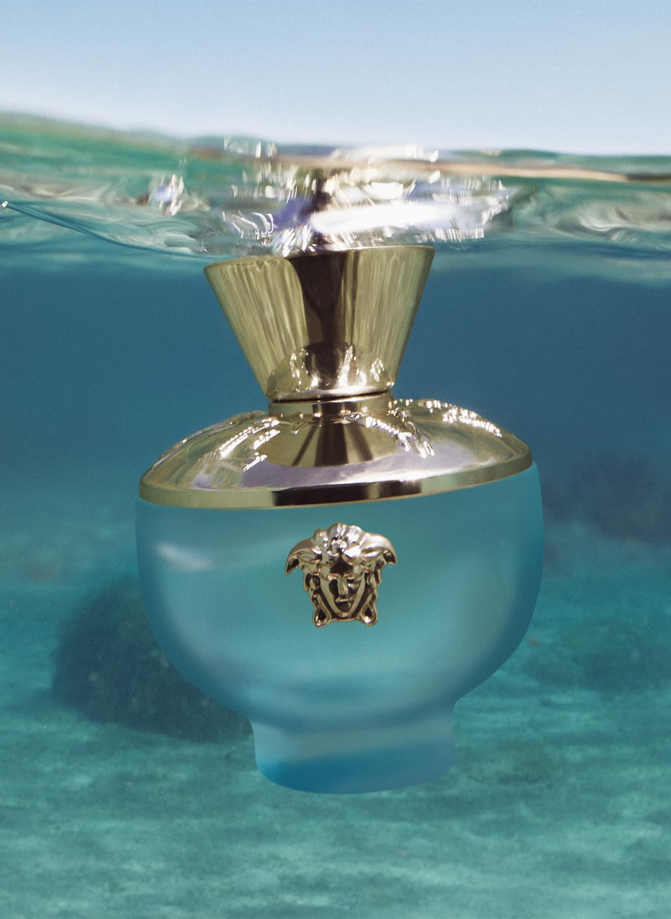 Versace Dylan Turquoise cap detail, refined craftsmanship