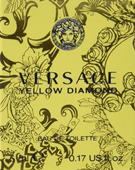Versace Yellow Diamond cap detail, luxe touch on a portable mini bottle.