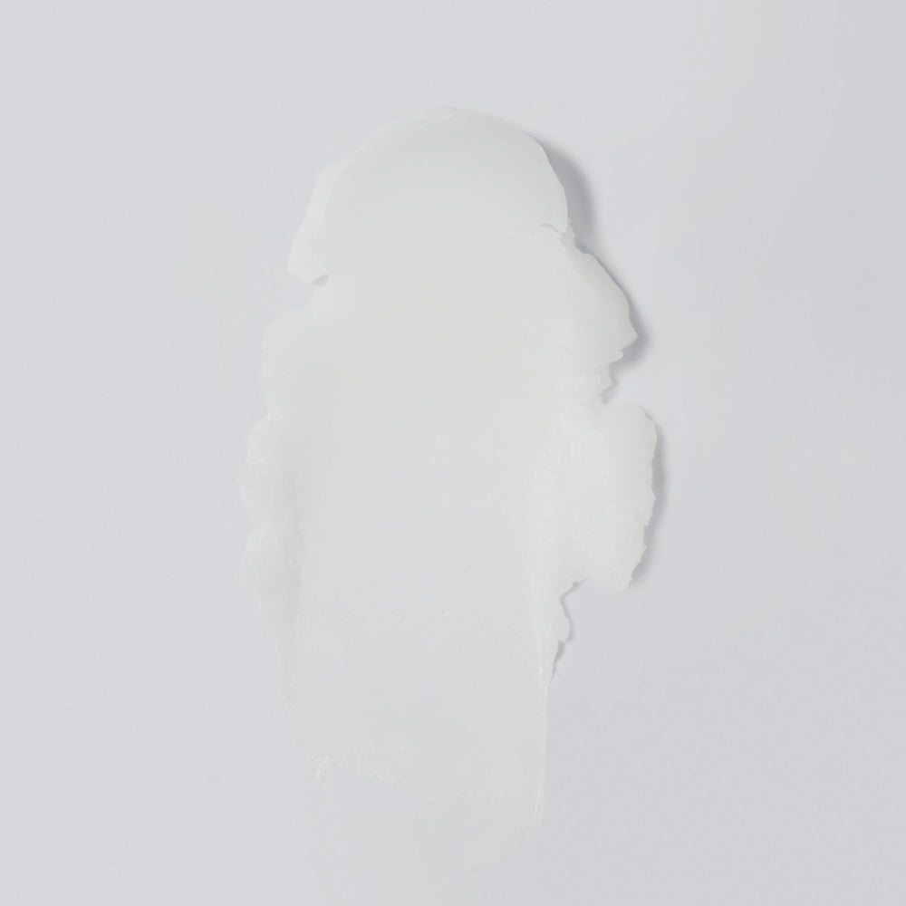 Versed Day Dissolve Balm texture closeup reveals oil-to-milk cleanse.